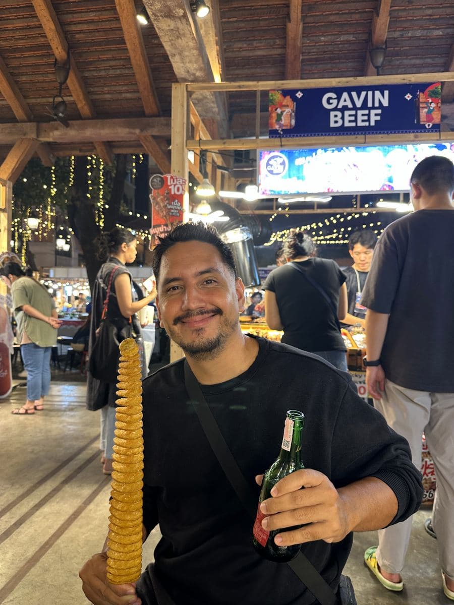 Arni with a potato spiral at the night market